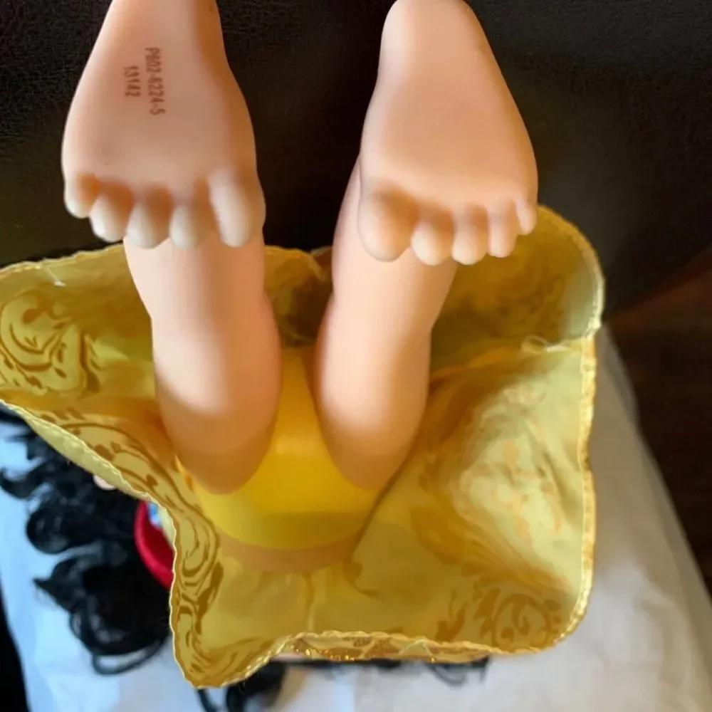 Please see Pictures! No shoes and ink marks on one leg. Exclusive doll!